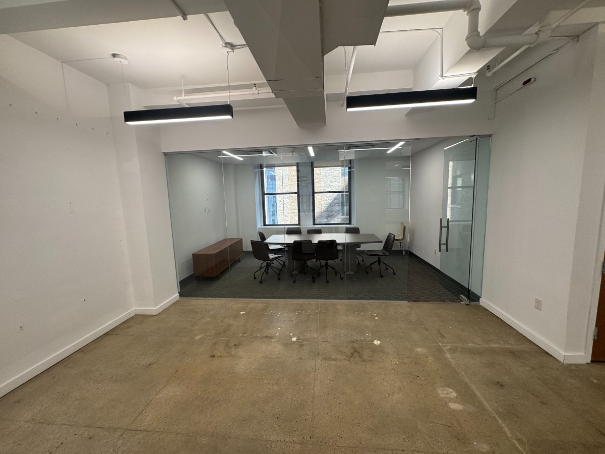 Modern conference room with city views, Suite 1002 at 286 Madison Avenue