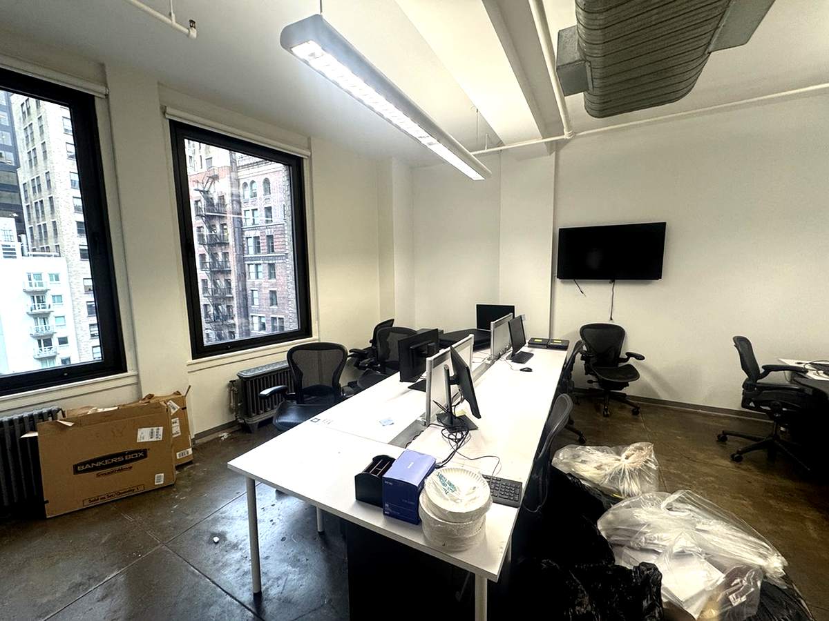 Benching workstations with perimeter window and city views, 16th floor at 15 Maiden Lane
