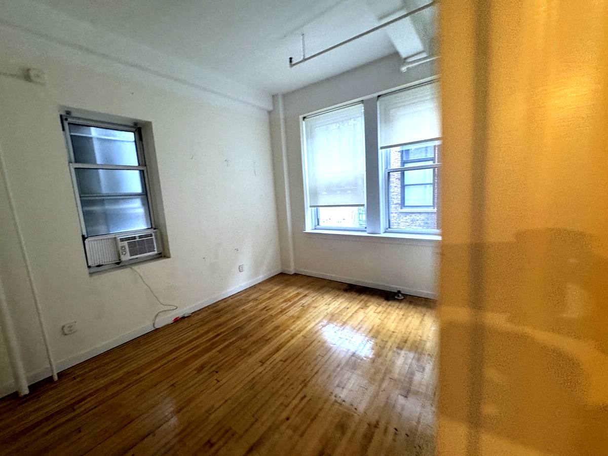 Corner office with double window and hardwood floors, 11th floor at 7 West 30th Street