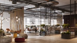 Modern New York office with large windows, greenery, desks, and bike.