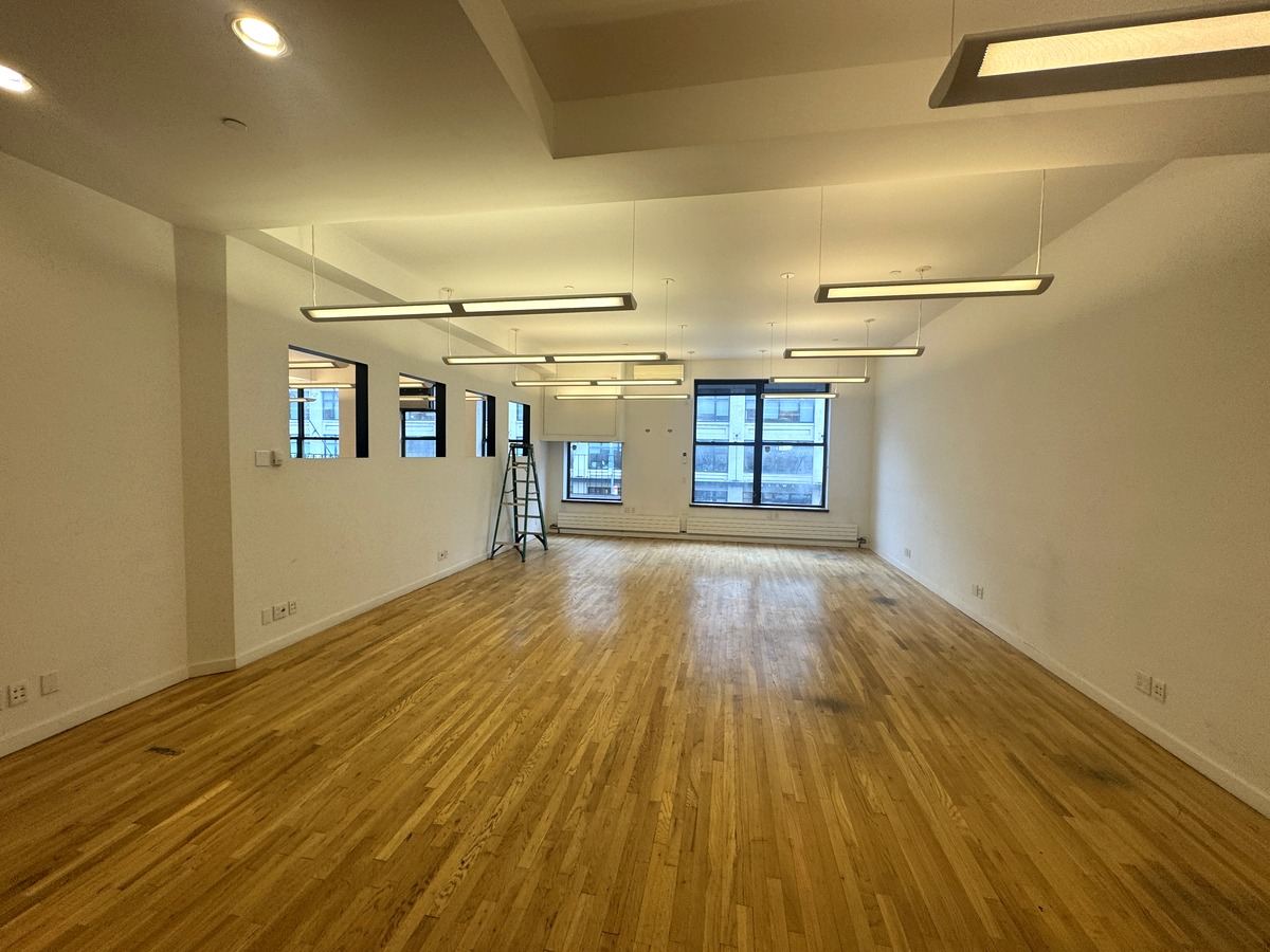 Wide open floor with hardwood and pendant lighting, Suite 2N at 420 West 14th Street