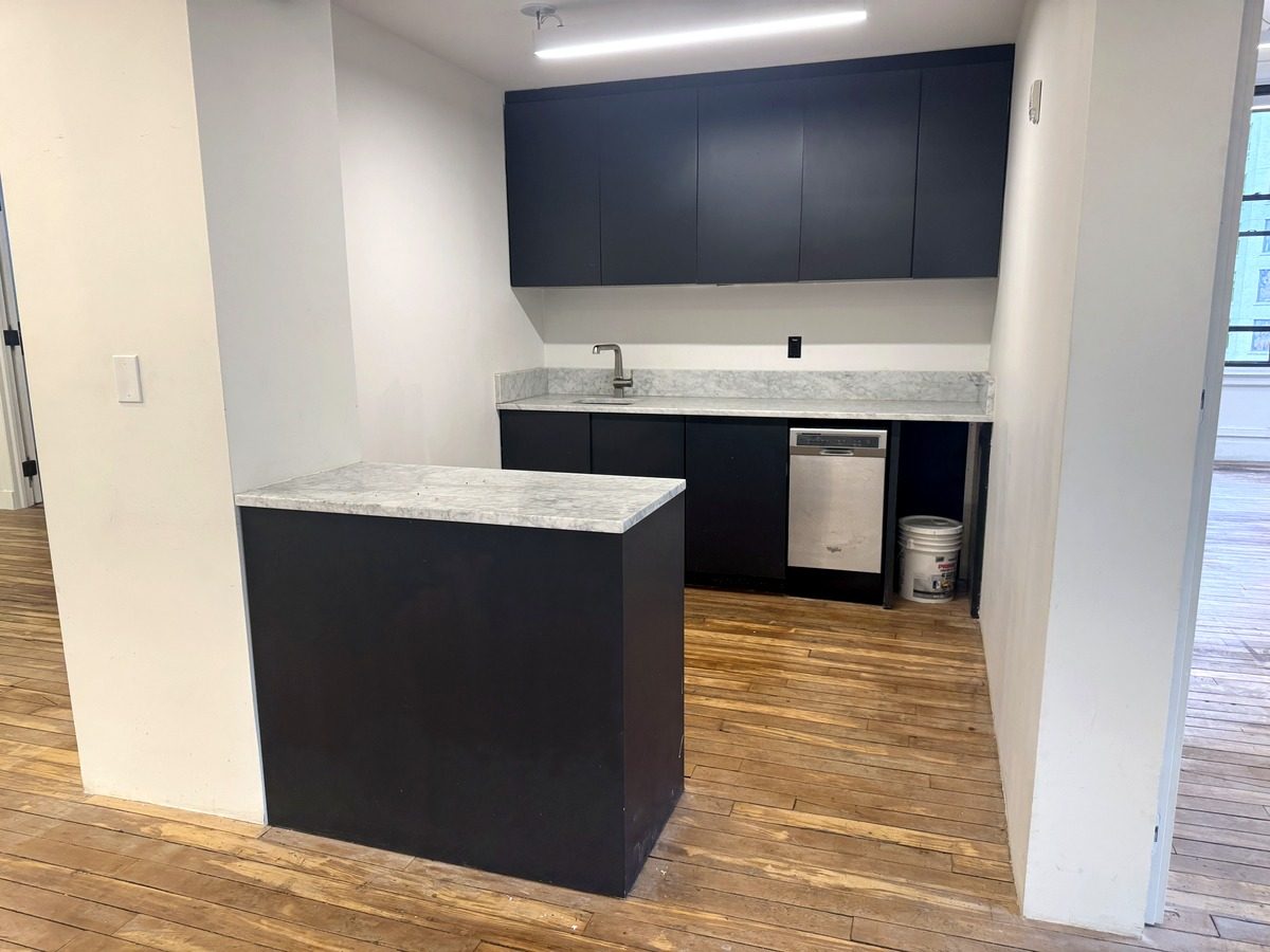 Pantry with stone counter and island, partial 9th floor at 31-37 West 27th Street
