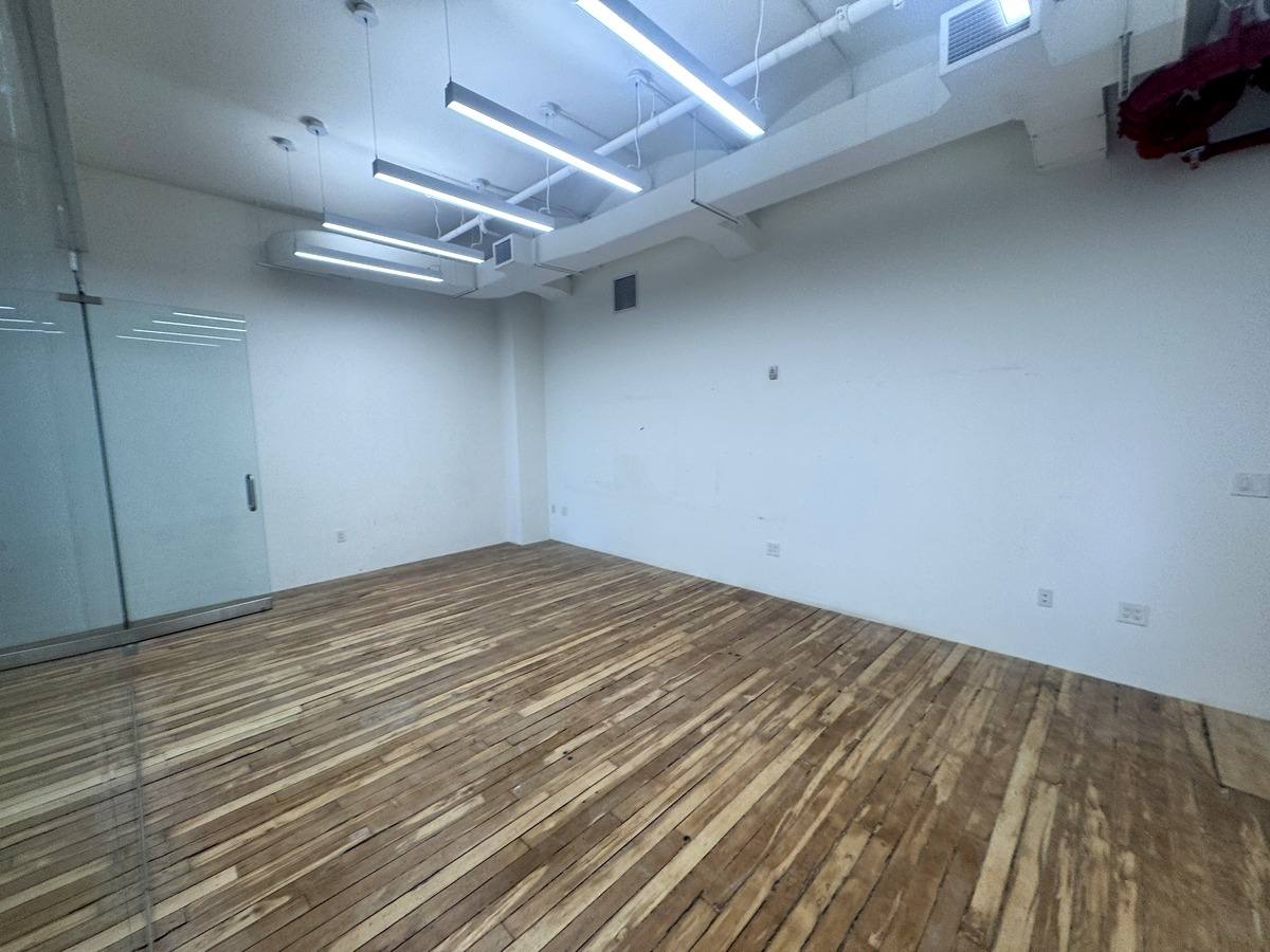 Bright room with exposed ceiling, partial 9th floor at 31-37 West 27th Street