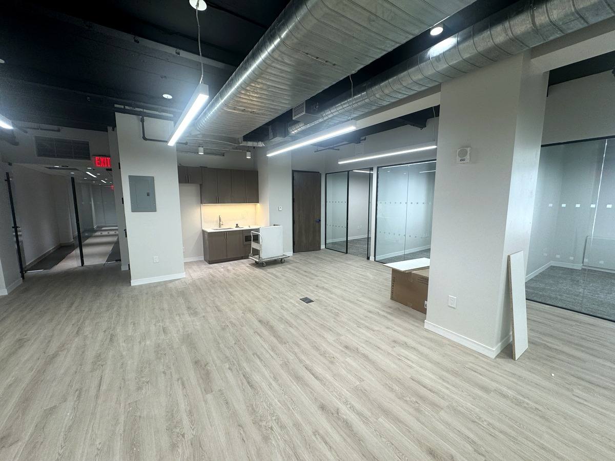 Bullpen with exposed ductwork and pantry wall, Suite 1220 at 39 Broadway