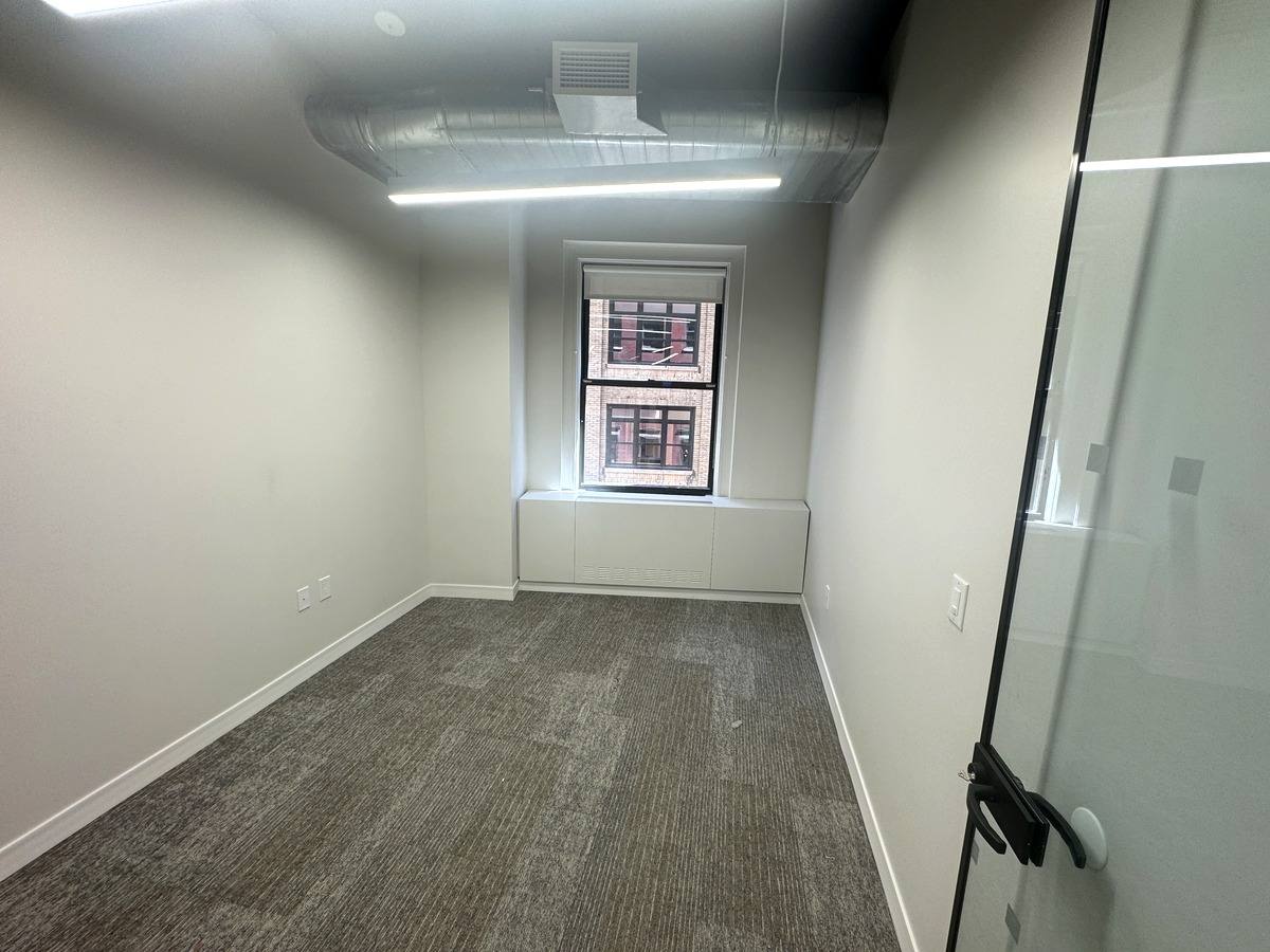 Carpeted private office with window, Suite 1220 at 39 Broadway