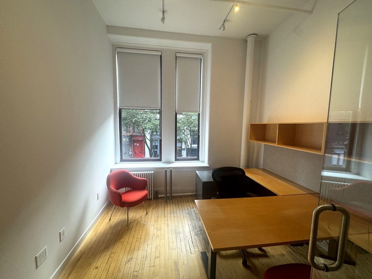 Private office with two windows and built-in shelving, 2nd floor at 380 Lafayette Street