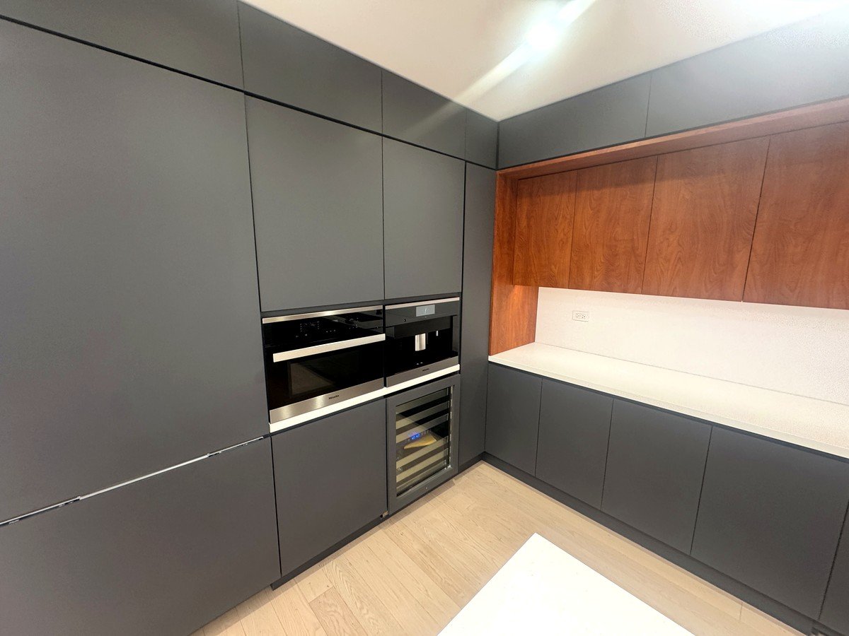 Pantry wall with built-in oven and wine fridge, 5th floor at 530 West 25th Street