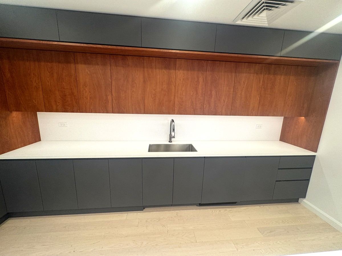 Pantry with wood backsplash and stone counter, 5th floor at 530 West 25th Street