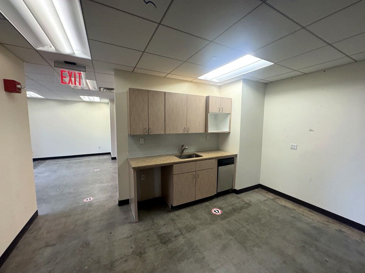 Pantry with wood cabinets and sink, Suite 1502A at 80 Maiden Lane