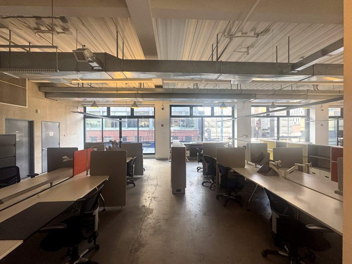 Open workstations facing a wall of windows, 4th floor at 415 West 13th Street
